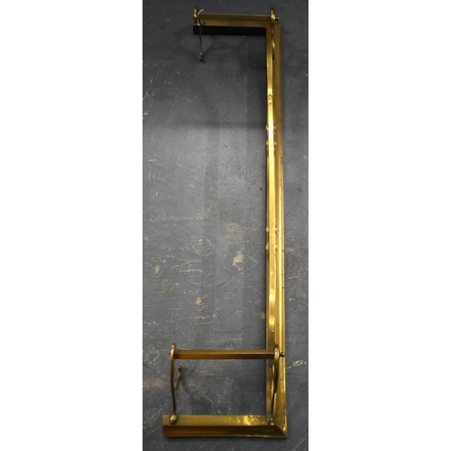 118 - AN ART NOUVEAU BRASS FENDER. 127 cm wide.