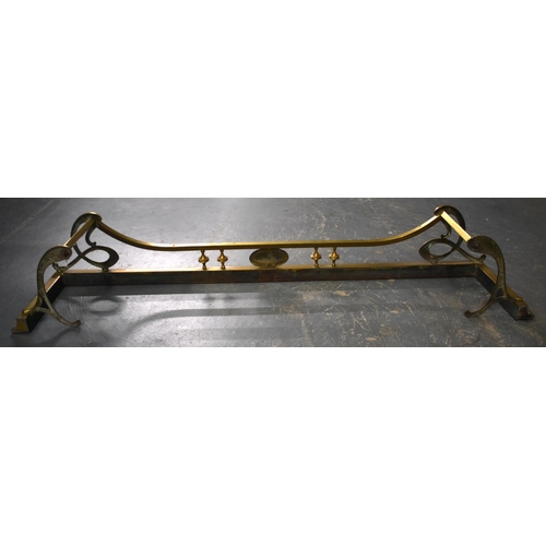 118 - AN ART NOUVEAU BRASS FENDER. 127 cm wide.