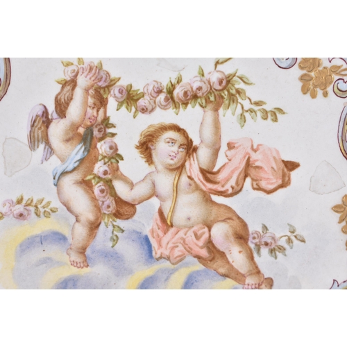 128 - A PAIR OF 18TH CENTURY CONTINENTAL FLUTED POTTERY DISHES painted with putti. 25 cm wide.