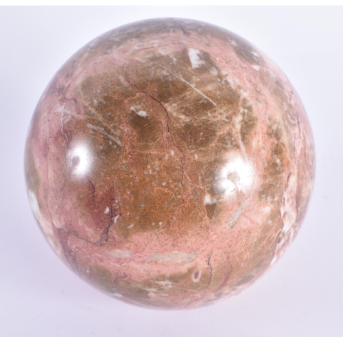 13 - A LATE 19TH CENTURY CARVED RHODONITE SCHOLARS BALL ON STAND. 11 cm diameter. (2)