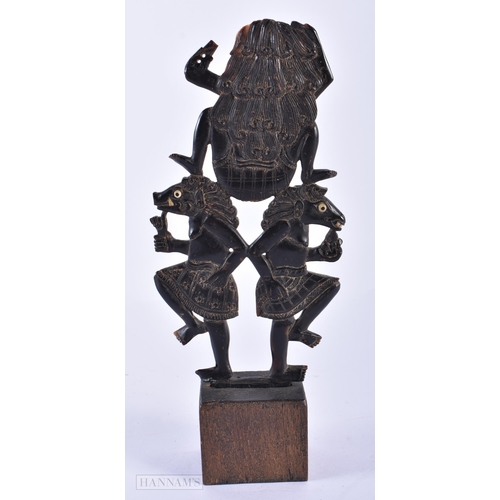 130A - AN UNUSUAL 19TH CENTURY BALINESE CARVED HORN DANCING BEAST SCULPTURE. 21 cm x 9 cm