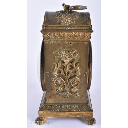 130D - AN EARLY 19TH CENTURY FRENCH ORMOLU CLOCK Courvoisier Et Comp, decorated with repousse foliage, upon... 