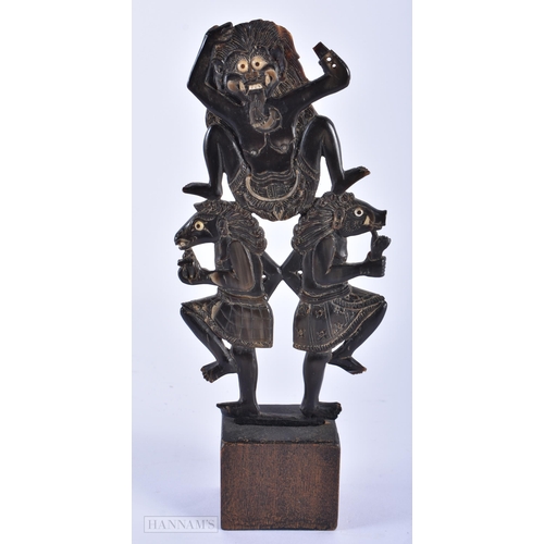 130A - AN UNUSUAL 19TH CENTURY BALINESE CARVED HORN DANCING BEAST SCULPTURE. 21 cm x 9 cm