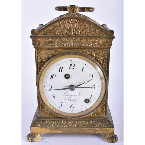 130D - AN EARLY 19TH CENTURY FRENCH ORMOLU CLOCK Courvoisier Et Comp, decorated with repousse foliage, upon... 