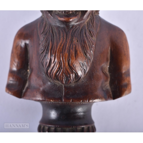 135A - AN EARLY 19TH CENTURY CARVED FRUITWOOD TREEN NUT CRACKER formed as a half torso. 19 cm x 7 cm