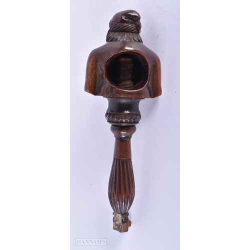 135A - AN EARLY 19TH CENTURY CARVED FRUITWOOD TREEN NUT CRACKER formed as a half torso. 19 cm x 7 cm