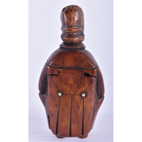 135B - AN EARLY 19TH CENTURY CARVED FRUITWOOD TREEN SNUFF BOX formed as a male wearing a four buttoned suit... 