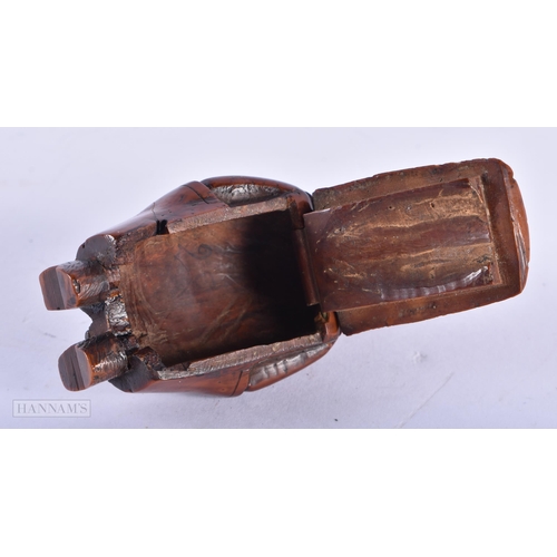 135B - AN EARLY 19TH CENTURY CARVED FRUITWOOD TREEN SNUFF BOX formed as a male wearing a four buttoned suit... 