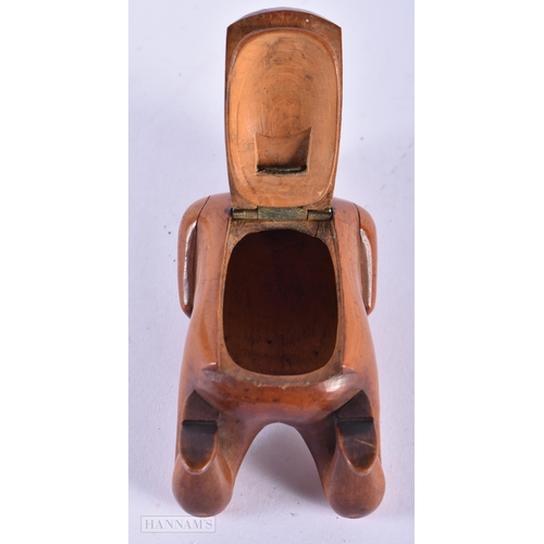 135C - A LOVELY EARLY 19TH CENTURY CARVED FRUITWOOD TREEN SNUFF BOX formed as a male with hands clasped upo... 