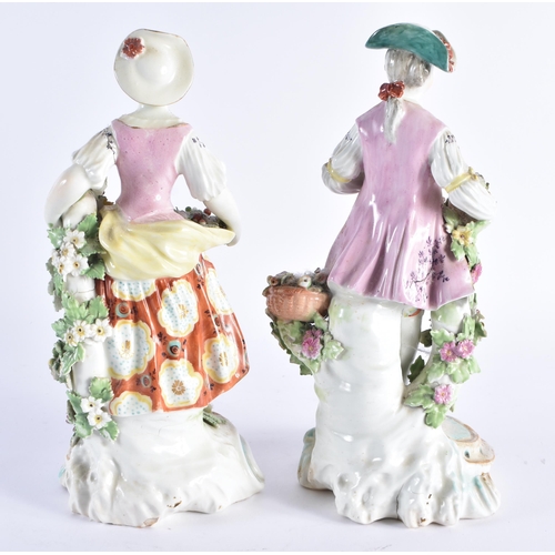 135 - A LARGE PAIR OF 18TH CENTURY ENGLISH PORCELAIN FIGURES modelled as a male and female encrusted with ... 