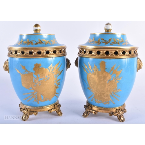 140B - A PAIR OF 19TH CENTURY FRENCH SEVRES PORCELAIN POT POURRI AND COVERS painted with gilt flowers. 27 c... 