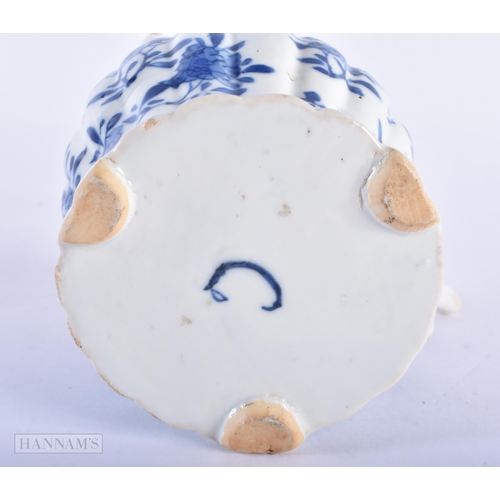 140D - A 17TH/18TH CENTURY CHINESE BLUE AND WHITE LOBED TEAPOT AND COVER Kangxi, painted with flowers. 17 c... 