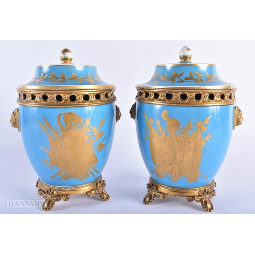 140B - A PAIR OF 19TH CENTURY FRENCH SEVRES PORCELAIN POT POURRI AND COVERS painted with gilt flowers. 27 c... 