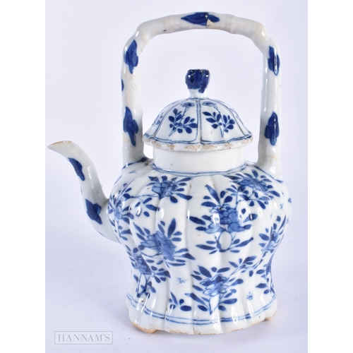 140D - A 17TH/18TH CENTURY CHINESE BLUE AND WHITE LOBED TEAPOT AND COVER Kangxi, painted with flowers. 17 c... 