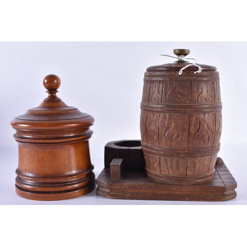 141 - AN ANTIQUE BLACK FOREST BAVRIAN DOG DESK STAND together with a treen jar and cover. Largest 16 cm x ... 