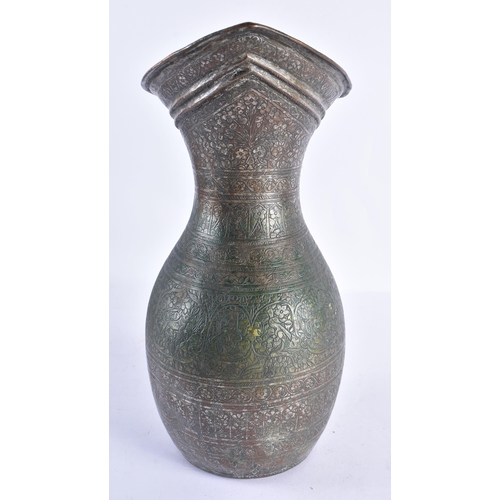 142 - A LARGE 18TH/19TH CENTURY PERSIAN ISLAMIC BRONZE ALLOY JUG decorated all over with birds, foliage an... 