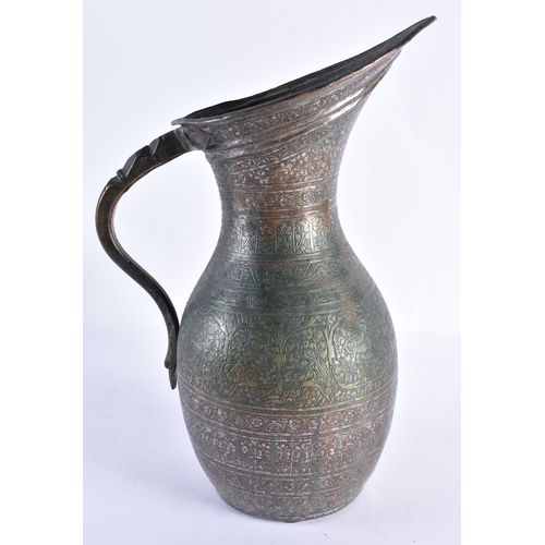 142 - A LARGE 18TH/19TH CENTURY PERSIAN ISLAMIC BRONZE ALLOY JUG decorated all over with birds, foliage an... 