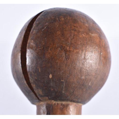 143 - A LARGE 19TH CENTURY AFRICAN TRIBAL CARVED WOOD KNOBKERRIE. 88 cm long.