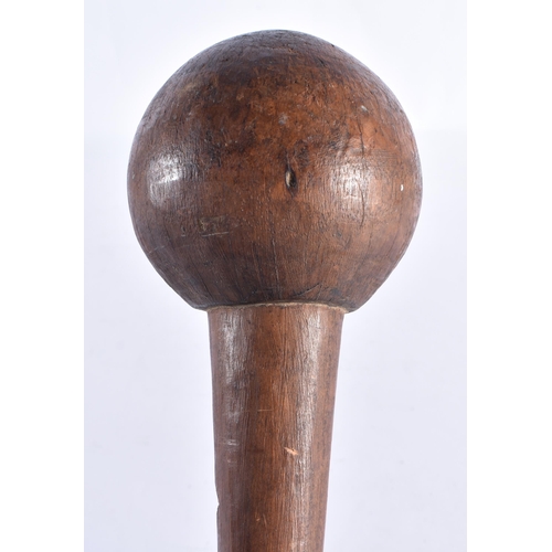 143 - A LARGE 19TH CENTURY AFRICAN TRIBAL CARVED WOOD KNOBKERRIE. 88 cm long.