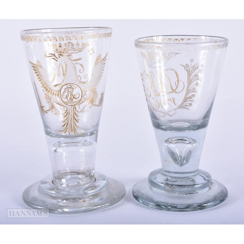 145D - A NEAR PAIR OF 18TH/19TH CENTURY CONTINENTAL GILDED GLASSES possibly Prussian. 12 cm x 8 cm