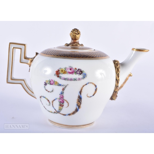 150C - A 19TH CENTURY MEISSEN PORCELAIN BULLET FORM TEAPOT AND COVER painted with a floral wreath monogram.... 