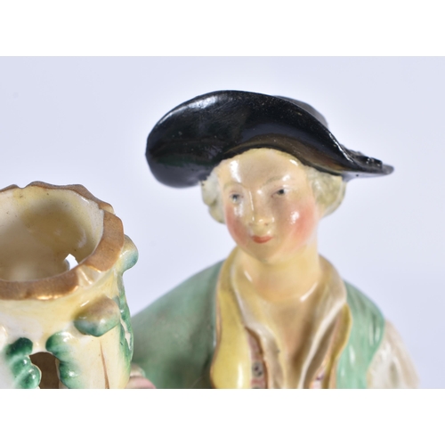 166 - A PAIR OF 18TH CENTURY DERBY PORCELAIN CANDLESTICKS formed as a male and female. 26 cm high.