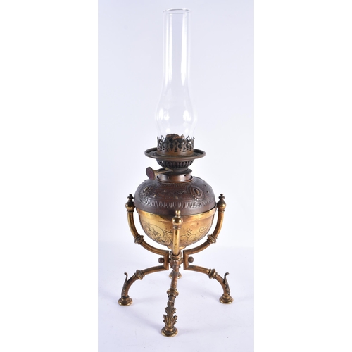 168 - A LARGE ARTS AND CRAFTS MIXED METAL OIL LAMP. 53 cm high.