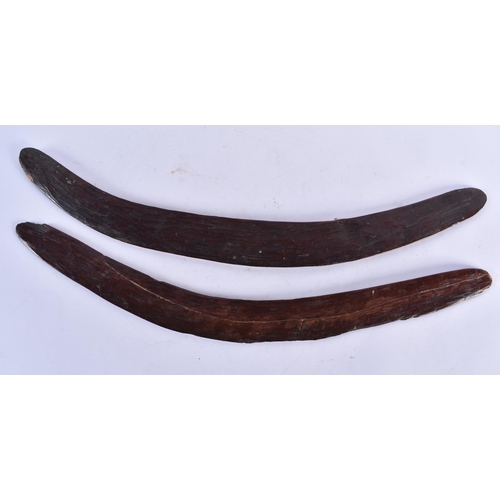 191 - TWO ABORIGINAL STONE CARVED WOOD BOOMERANGS. 55 cm long. (2)