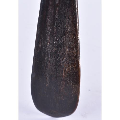 192 - A VERY LARGE EARLY 20TH CENTURY TRIBAL CARVED HORN SPOON signed RT. 48 cm long.