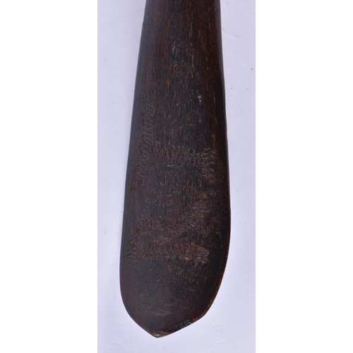 192 - A VERY LARGE EARLY 20TH CENTURY TRIBAL CARVED HORN SPOON signed RT. 48 cm long.