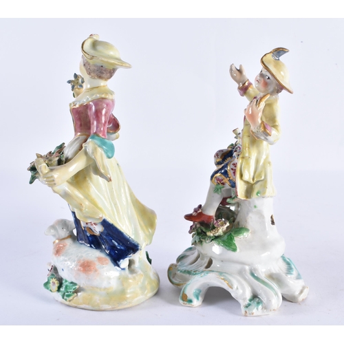 195 - A MATCHED PAIR OF 18TH CENTURY ENGLISH PORCELAIN FIGURES 16 cm high.