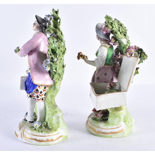 197 - A PAIR OF 19TH CENTURY FRENCH PORCELAIN FIGURES After an 18th century English original. 19 cm high.