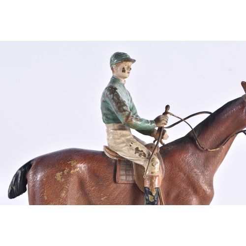 206 - AN EARLY 20TH CENTURY AUSTRIAN COLD PAINTED BRONZE ASHTRAY formed as a jockey on horseback. 19 cm hi... 