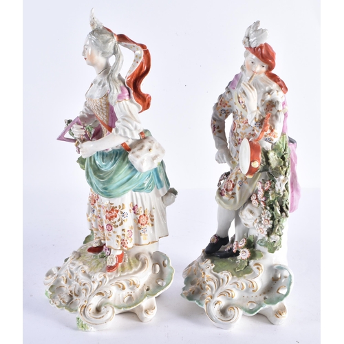 210 - A LARGE PAIR OF 18TH CENTURY DERBY PORCELAIN FIGURES one holding a tambourine. 27 cm high.