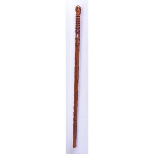 212 - A VINTAGE MINERS WALKING CANE. 82 cm long.