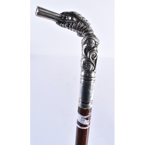 213 - AN ANTIQUE INDIAN SILVER MOUNTED MALACCA CANE. 90 cm long.