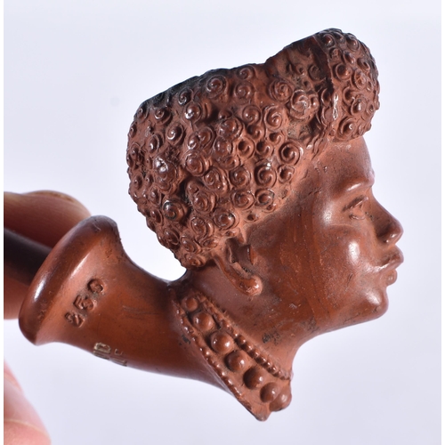 216 - A VINTAGE FRENCH TERRACOTTA NUBIAN PIPE. 22 cm long.