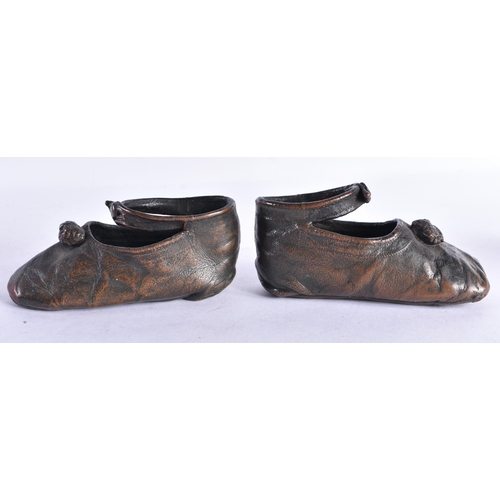 238 - A PAIR OF UNUSUAL ANTIQUE BRONZE SHOES together with a orange glass vase & another. (4)