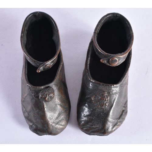 238 - A PAIR OF UNUSUAL ANTIQUE BRONZE SHOES together with a orange glass vase & another. (4)