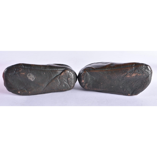 238 - A PAIR OF UNUSUAL ANTIQUE BRONZE SHOES together with a orange glass vase & another. (4)