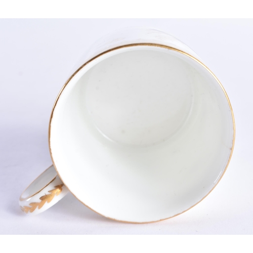 243 - AN EARLY 19TH CENTURY PARIS PORCELAIN CUP AND SAUCER together with two similar cups. (4)