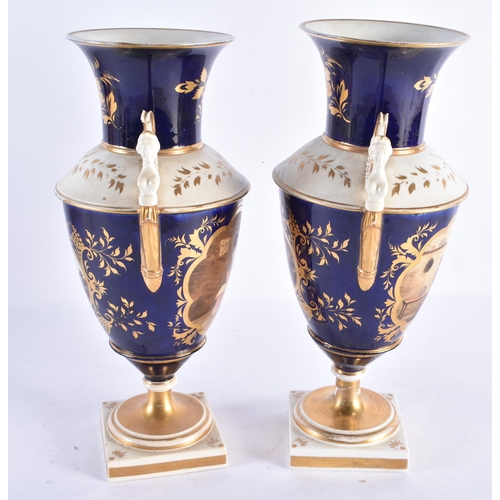 257 - A PAIR OF EARLY 19TH CENTURY ENGLISH PORCELAIN VASES painted with interior scenes. 31.5 cm high.