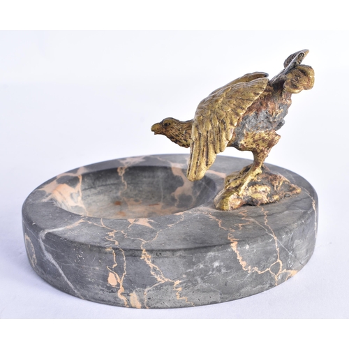 259 - AN ART DECO FRENCH PEWTER AND MARBLE DOG DESK STAND together with a bronze bird ashtray. Largest 15 ... 