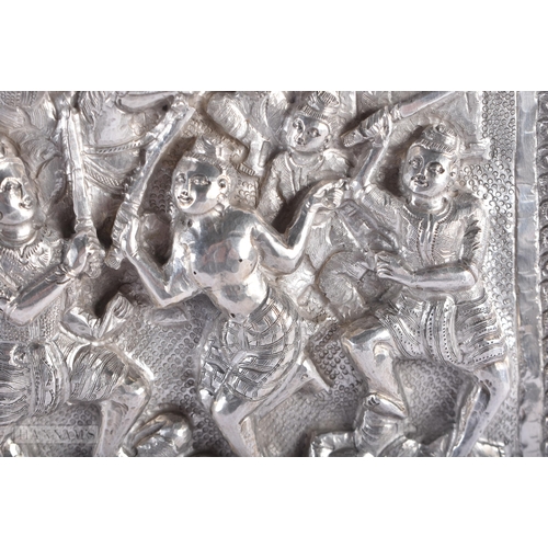 25D - A RARE LARGE 19TH CENTURY INDIAN BURMESE SILVER REPOUSSE PLAQUE decorated with numerous figures in v... 