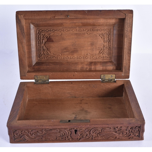 26 - A 19TH CENTURY ANGLO INDIAN CARVED SANDALWOOD BOX AND COVER decorated with foliage. 21 cm x 14 cm.