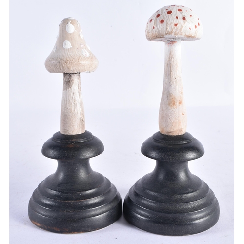 284 - TWO FOLK ART CARVED WOOD MUSHROOM SPECIMANS. 14 cm high. (2)