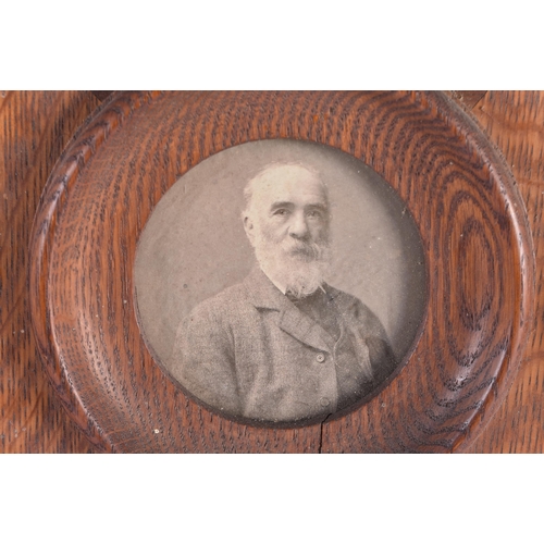 288 - A LARGE ENGLISH EDWARDIAN CARVED OAK DOUBLE PHOTOGRAPH FRAME. 48 cm x 28 cm.