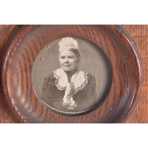 288 - A LARGE ENGLISH EDWARDIAN CARVED OAK DOUBLE PHOTOGRAPH FRAME. 48 cm x 28 cm.