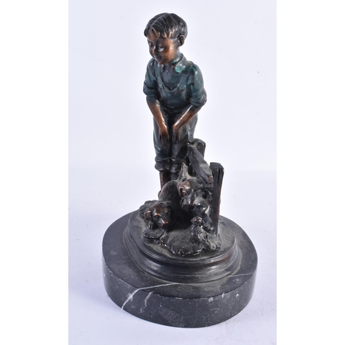 299 - A CONTEMPORARY COLD PAINTED BRONZE FIGURE OF A BOY modelled with puppies. 24 cm high.