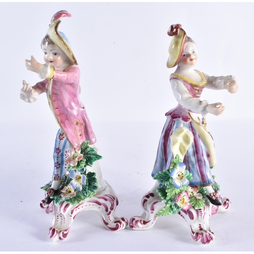 30 - A PAIR OF 18TH CENTURY ENGLISH PORCELAIN FIGURES modelled as a male and female standing beside folia... 